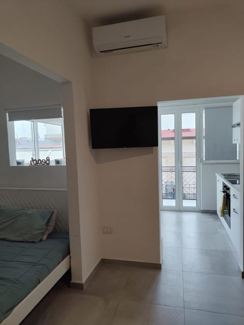 Communal lounge/ TV room, Bed, TV and multimedia, Kitchen or kitchenette, Photo of the whole room, minibar, air conditioner