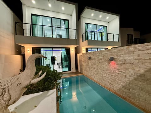 Property building, Night, Swimming pool