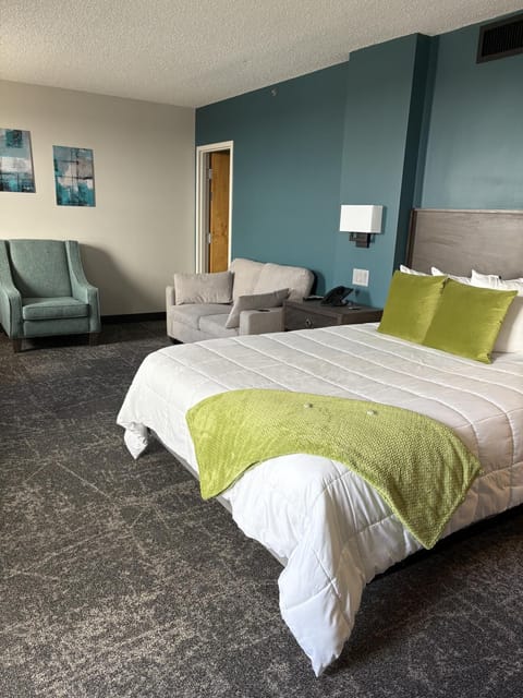 Bed, Living room, Seating area, Bedroom