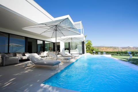 Property building, Natural landscape, Living room, Seating area, Mountain view, Pool view, Swimming pool, sunbed