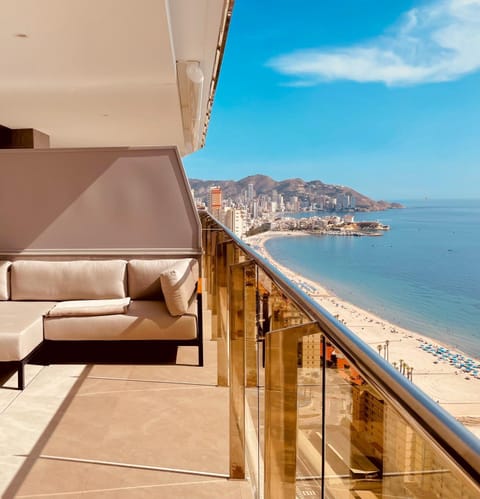 View (from property/room), Balcony/Terrace, Seating area, Beach, Sea view