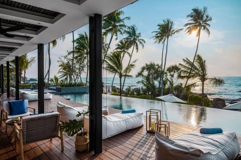Property building, View (from property/room), Balcony/Terrace, Seating area, Sea view, Swimming pool