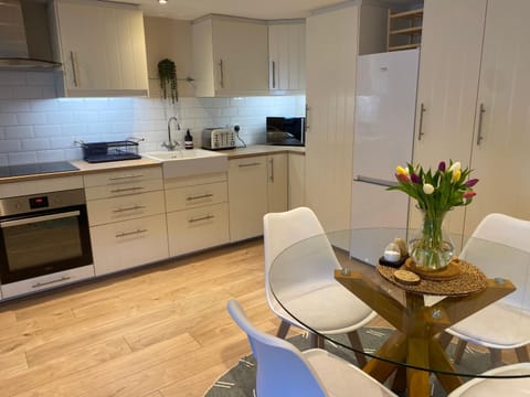 Kitchen or kitchenette, Dining area, dishwasher, oven, stove, toaster