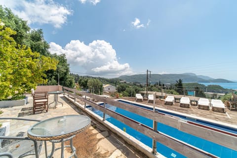 Property building, Living room, Swimming pool