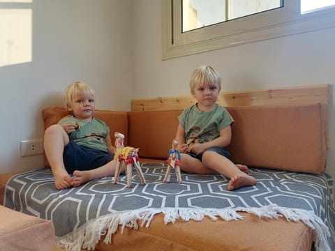 Communal lounge/ TV room, People, Seating area, children