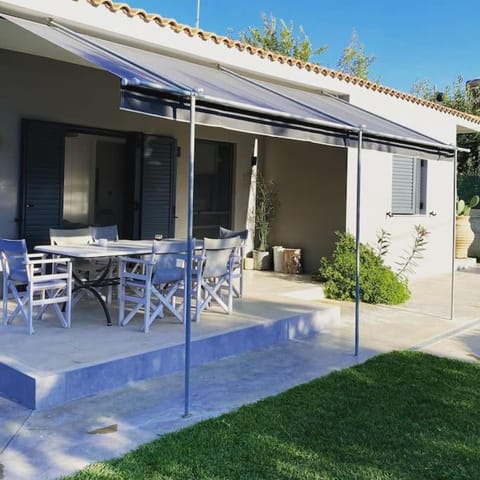Property building, Patio, Garden, Dining area, Garden view