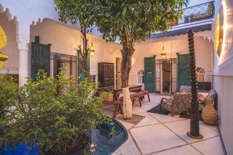 Property building, Patio, Garden, Living room, Seating area, Garden view, Swimming pool