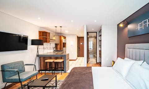 Bed, TV and multimedia, Kitchen or kitchenette, Living room, Photo of the whole room, Bedroom, hair dresser