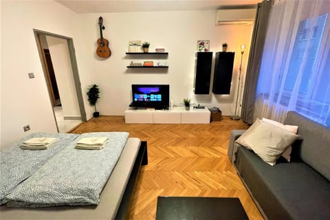 Bed, TV and multimedia, Living room, Bedroom