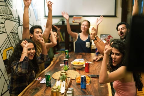 Communal lounge/ TV room, Game Room, Food and drinks, group of guests