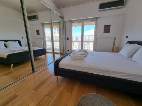 Bed, Photo of the whole room, Bedroom, towels, air conditioner