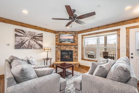 TV and multimedia, Living room, Seating area, Garden view, fireplace, furniture