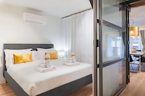 Bed, Photo of the whole room, Bedroom, towels, air conditioner