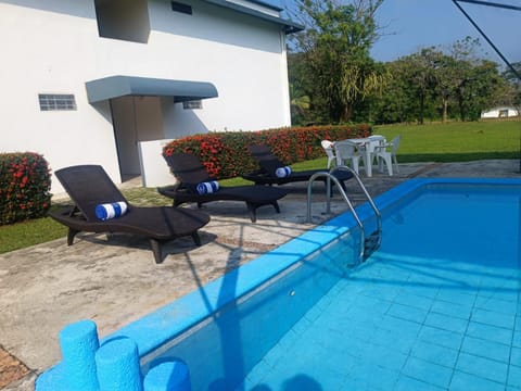 Property building, Swimming pool, sunbed