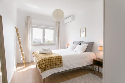 Bed, View (from property/room), Photo of the whole room, Decorative detail, Bedroom, towels, air conditioner