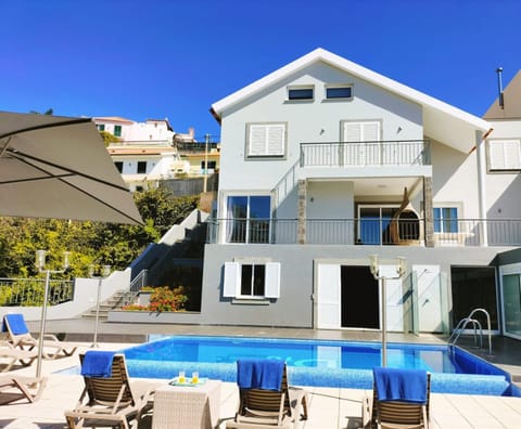Property building, Patio, Swimming pool