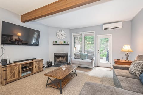 Patio, TV and multimedia, Living room, Seating area, fireplace, furniture, air conditioner