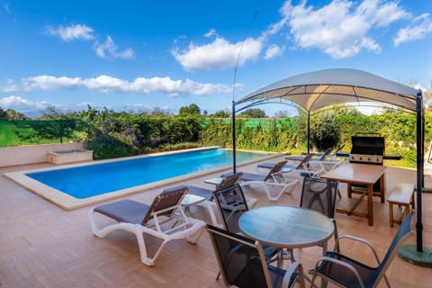 Property building, Living room, Swimming pool