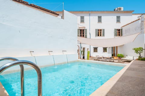 Property building, Living room, Swimming pool