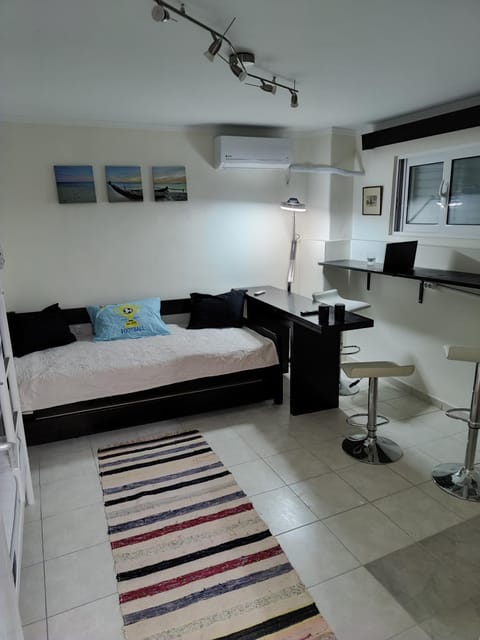 Bed, Seating area, hair dresser, air conditioner