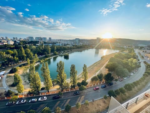 Nearby landmark, Day, Neighbourhood, City view, Lake view, Street view, Sunset