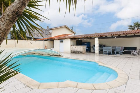 Property building, Living room, Swimming pool