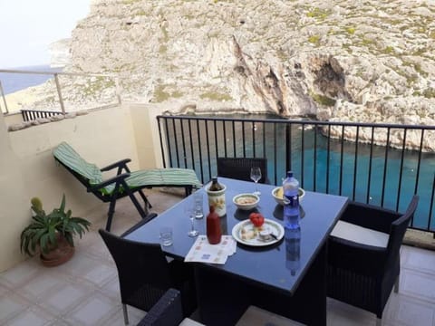 Seafront Penthouse with Terrace in Xlendi, Gozo Apartment in Munxar