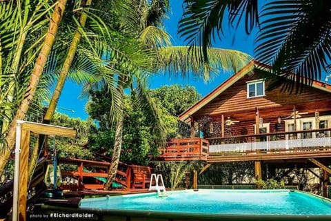 Property building, Patio, Natural landscape, Garden, Garden view, Pool view, Swimming pool