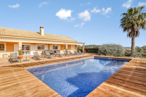 Property building, Patio, Swimming pool, sunbed