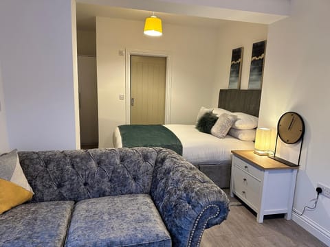 Bed, Seating area, Bedroom