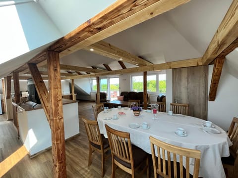 Communal lounge/ TV room, TV and multimedia, View (from property/room), Balcony/Terrace, Living room, Banquet/Function facilities, Seating area, Dining area, Garden view, children, group of guests, Family, furniture, internet