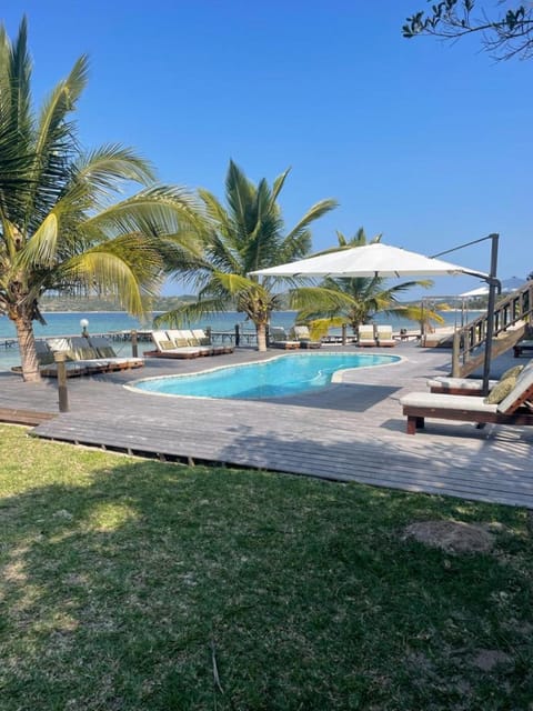 Property building, Day, Natural landscape, Beach, Swimming pool, sunbed