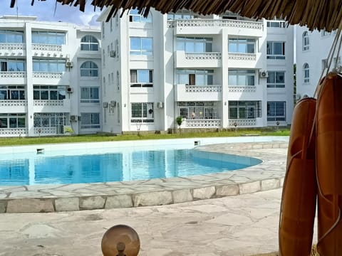 Property building, Pool view, Swimming pool, sunbed