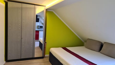 Bed, wardrobe