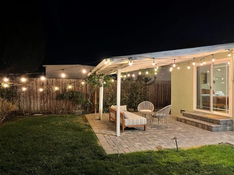 Property building, Patio, Night, Garden, Balcony/Terrace, Seating area, Garden view