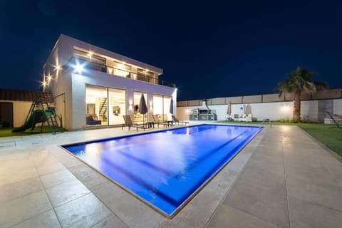 Property building, Night, Swimming pool, Swimming pool
