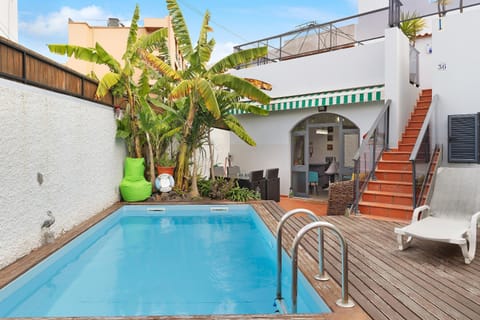 Property building, Living room, Swimming pool