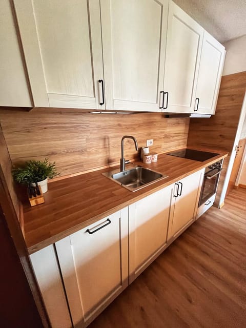 Kitchen or kitchenette, stove