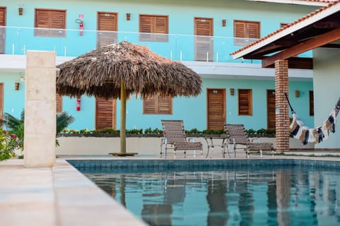 Property building, Day, Pool view, Swimming pool, sunbed