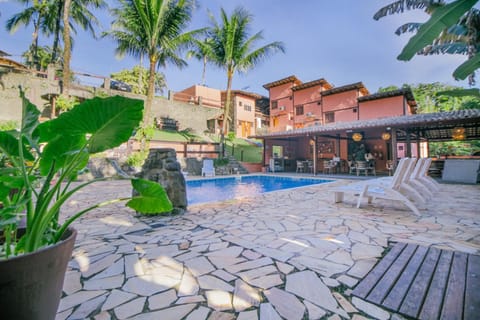 Property building, Day, Pool view, Swimming pool, sunbed