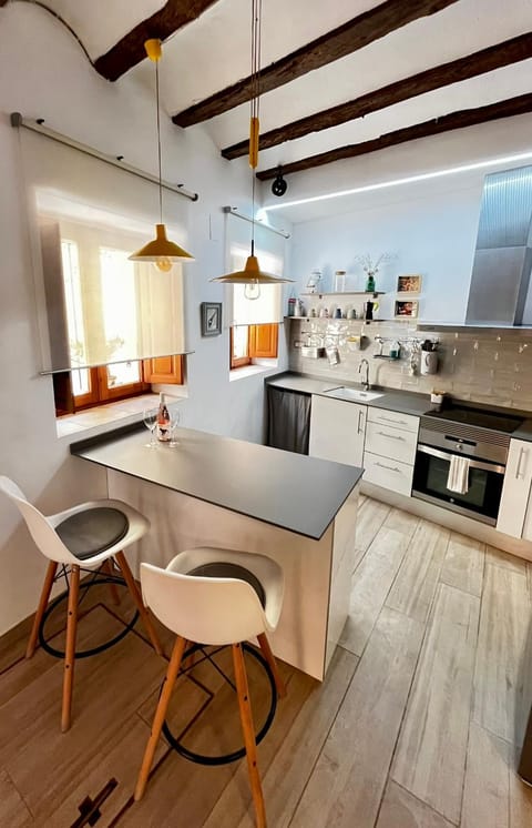 Kitchen or kitchenette, oven, stove