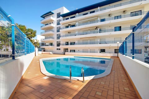Property building, Living room, Swimming pool
