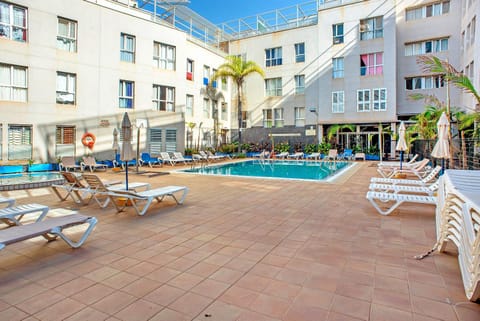 Property building, Living room, Swimming pool