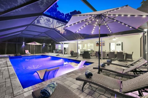 Patio, Night, Dining area, Pool view, Swimming pool, sunbed