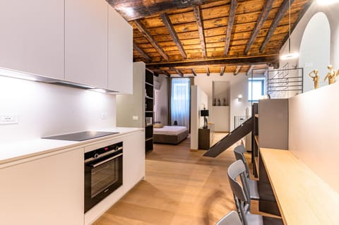 Kitchen or kitchenette, Photo of the whole room, Dining area, stove