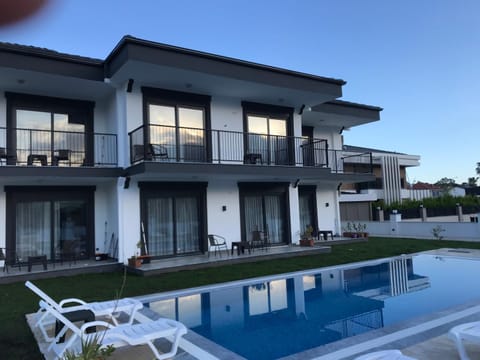 Property building, Day, Pool view, sunbed