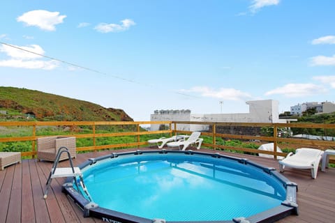 Property building, Living room, Swimming pool