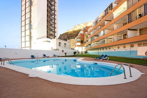 Property building, Living room, Swimming pool