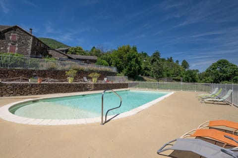 Property building, Living room, Swimming pool