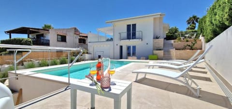 Property building, Living room, Swimming pool